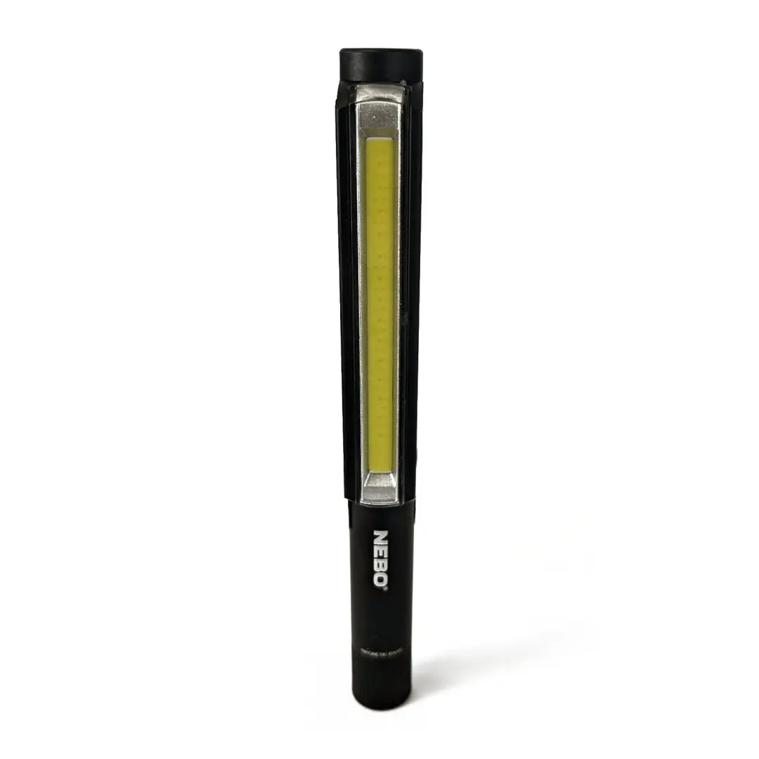 Slim black NEBO Lil Larry flashlight with a bright green LED strip for versatile lighting