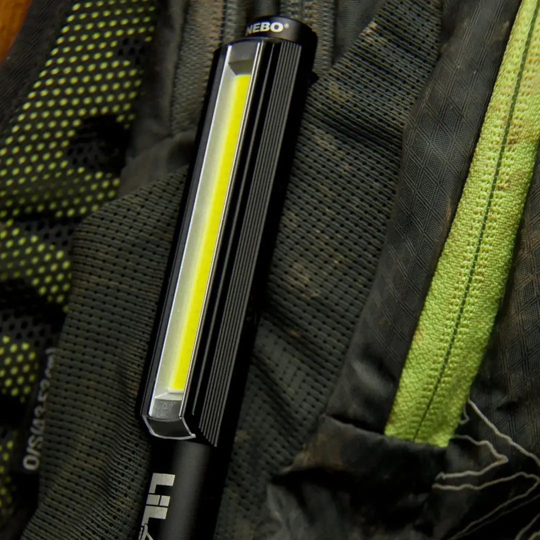 LED safety light on a backpack strap, perfect for NEBO Lil Larry adventures