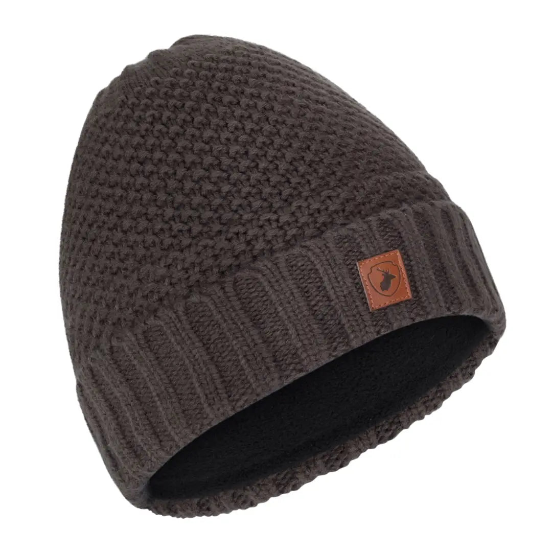 Dark brown knitted beanie hat with leather logo patch, perfect for your forest adventures