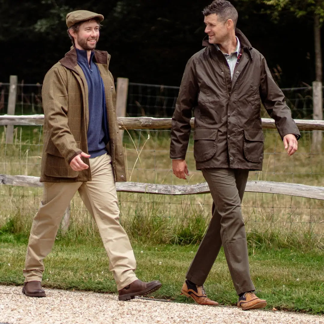 Two men in casual country-style outfits rocking Forest Classic Chinos on a walk