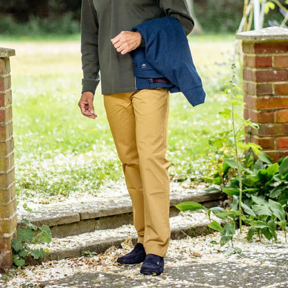 Person wearing New Forest Classic Chinos in khaki, perfect for stylish forest clothing