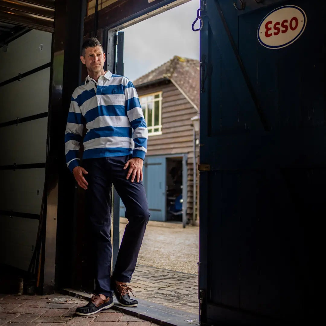 Man rocking a New Forest Classic Stripe Rugby Shirt with blue and white stripes