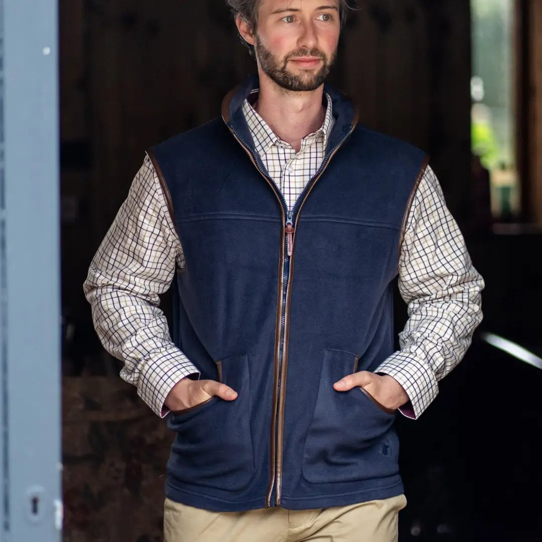 Navy blue fleece gilet over a checkered shirt, perfect for forest adventures