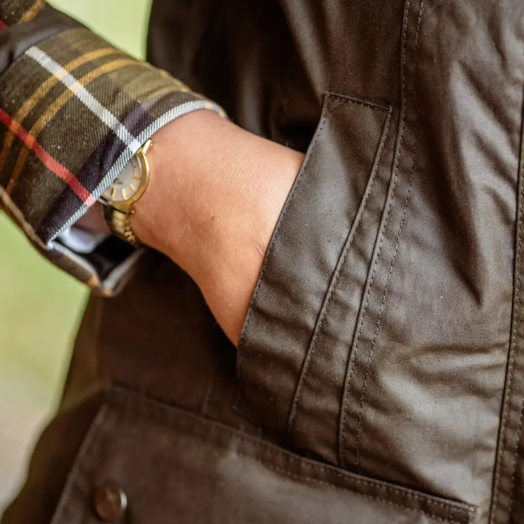 Brown leather jacket with plaid sleeve from the Forest Freya Ladies Wax collection