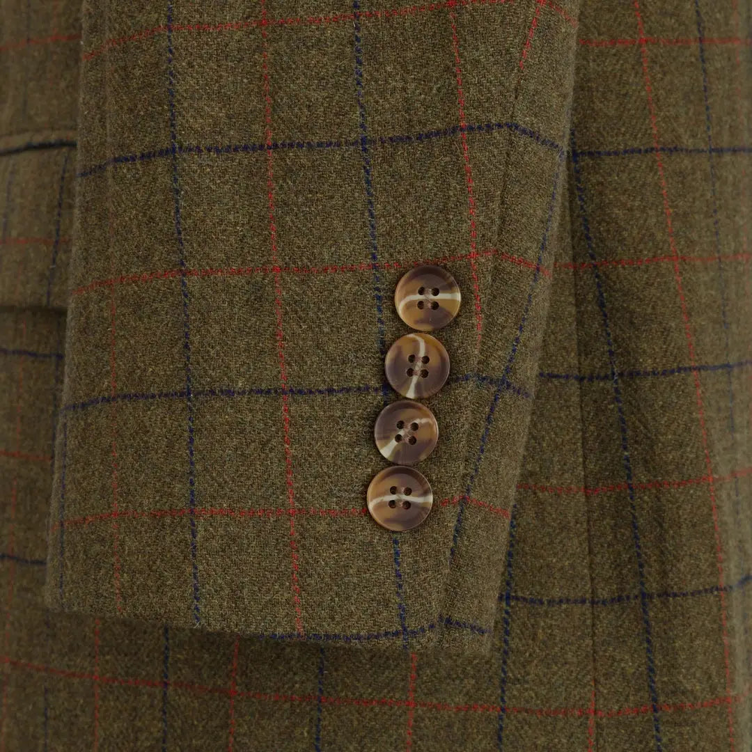 Sleeve cuff of a green plaid New Forest Goodwood Tweed Long Coat with four brown buttons