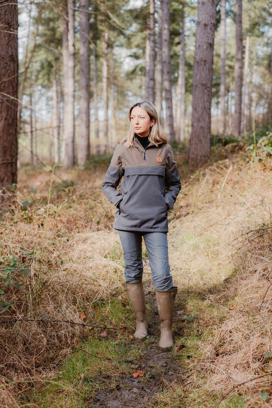 Woman wearing New Forest Ladies Nightjar Smock in a natural outdoor setting