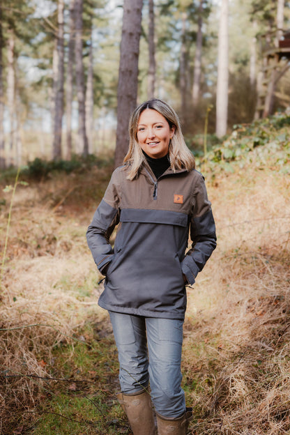 Woman wearing the New Forest Ladies Nightjar Smock in a beautiful outdoor setting