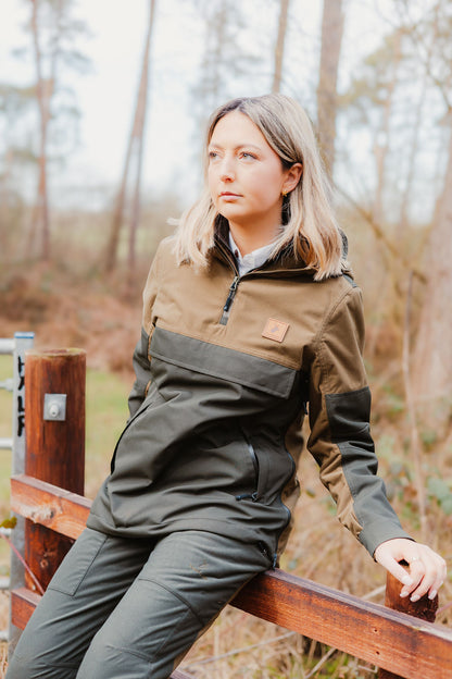 Woman showcasing the New Forest Ladies Nightjar Smock in stylish two-tone design