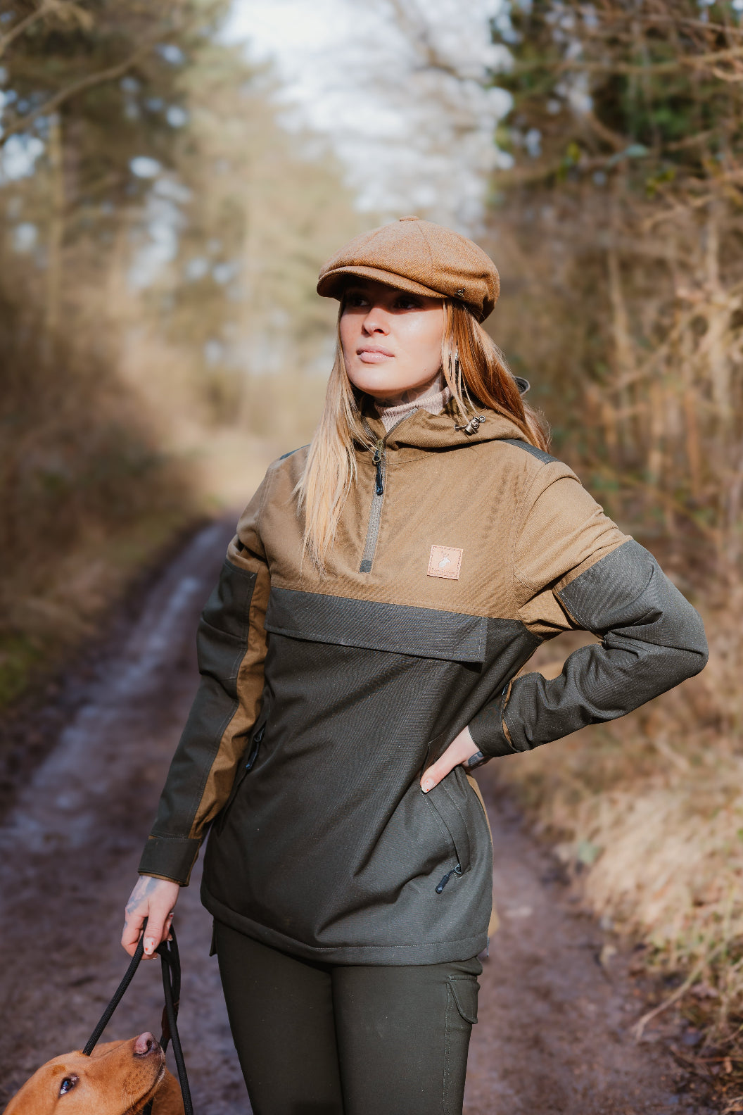 Woman in a stylish two-tone Forest Nightjar Smock, perfect for outdoor adventures