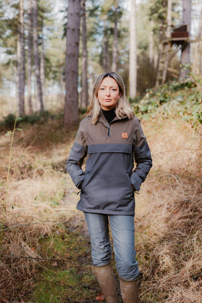 Woman in a stylish two-tone Forest Nightjar Smock, perfect for outdoor adventures