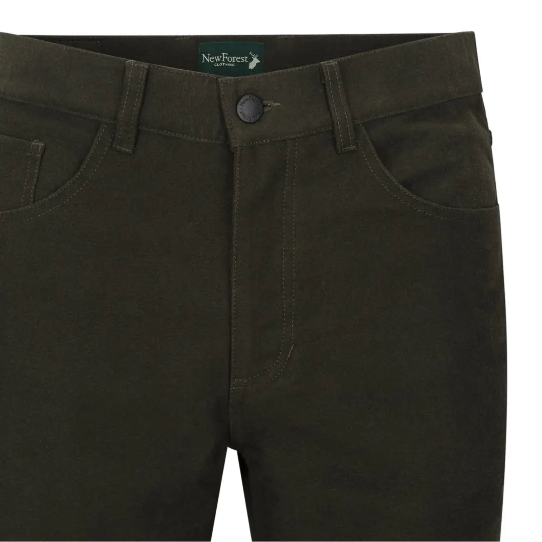 Dark green Forest Moleskin Jeans with visible waistband and front pockets