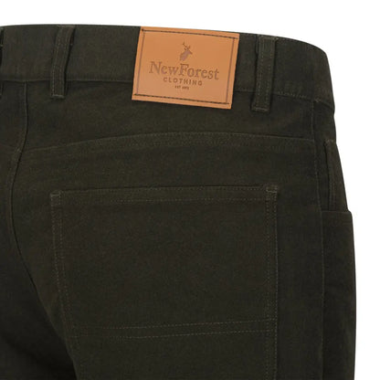 Dark green Forest Moleskin Jeans with a leather brand patch on the waistband