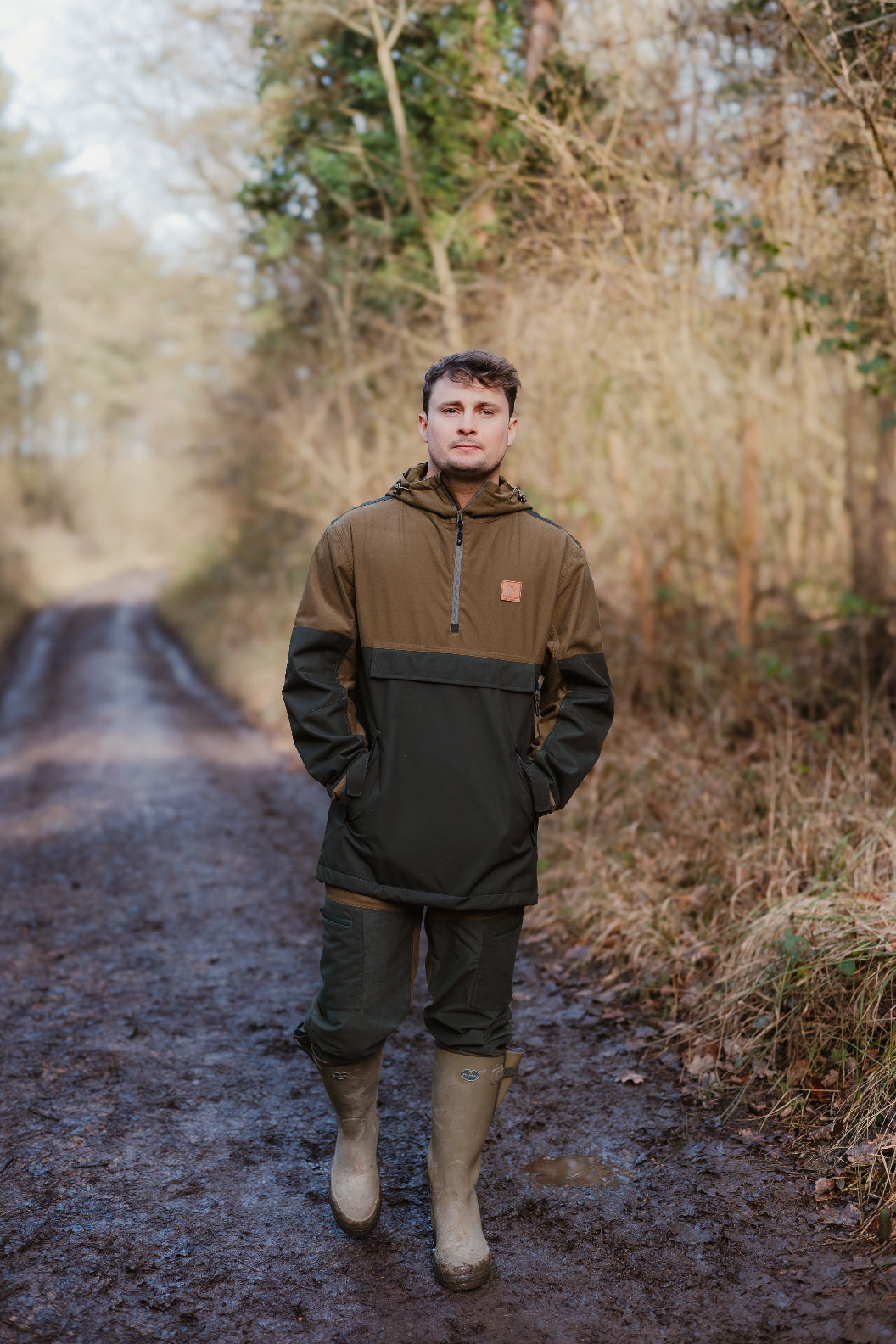 Man wearing outdoor gear in a New Forest Nightjar Smock ready for adventure