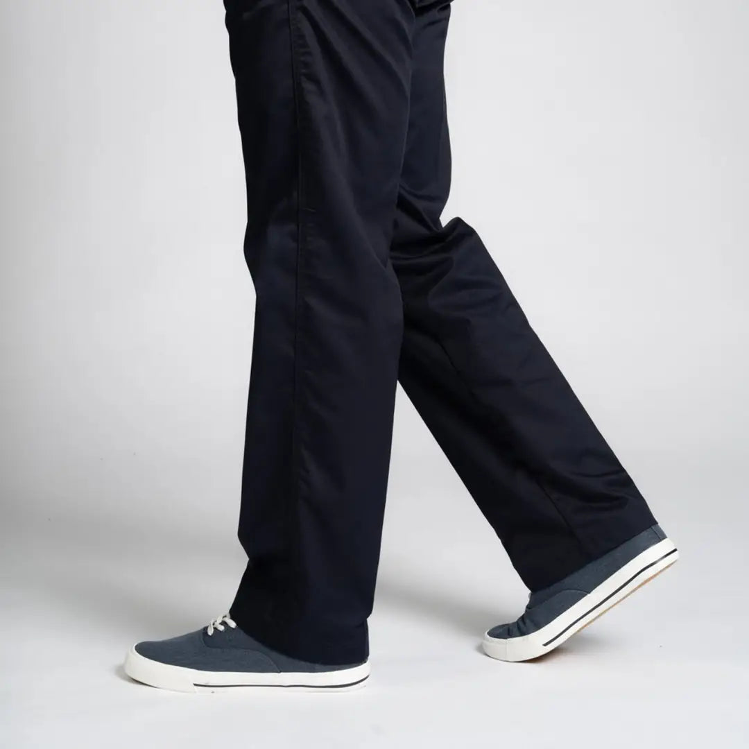 Navy blue wide-leg Rugby Trousers with elasticated waist and gray sneakers for country clothing