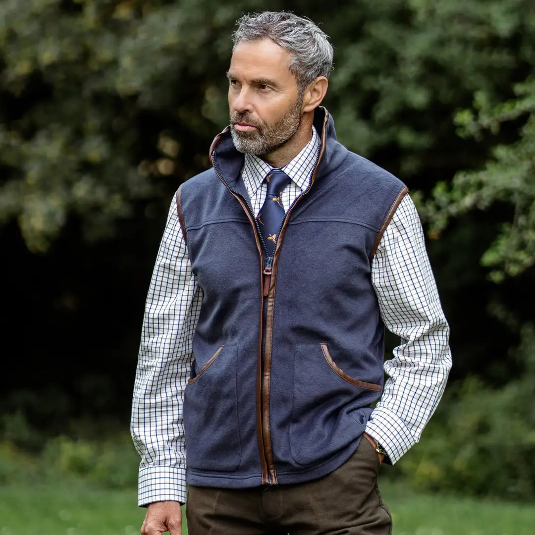 Navy blue fleece vest over a New Forest Premium Tattersall Shirt in cotton fabric