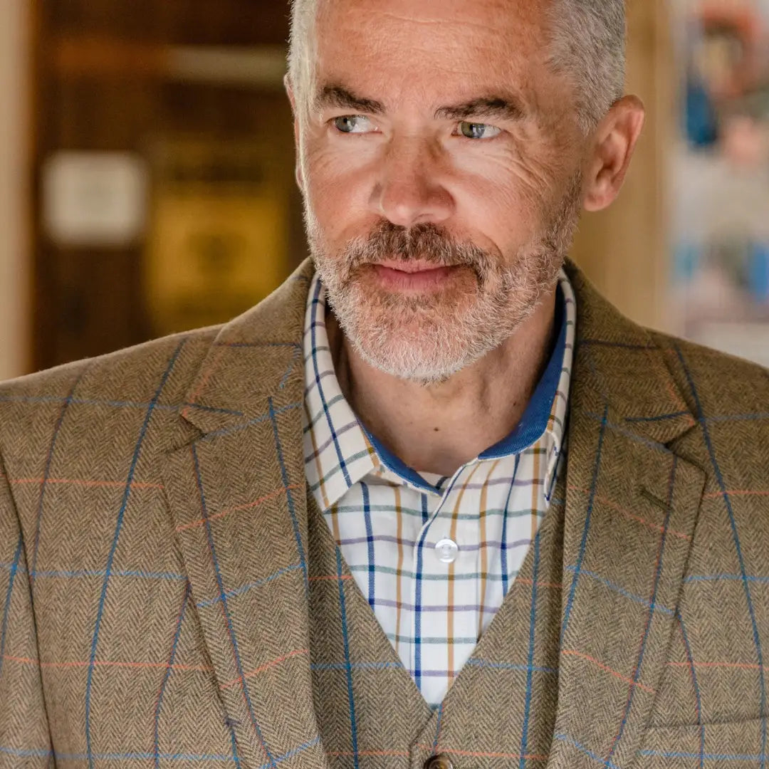 Older gentleman in tweed with gray hair models New Forest Premium Tattersall Shirt