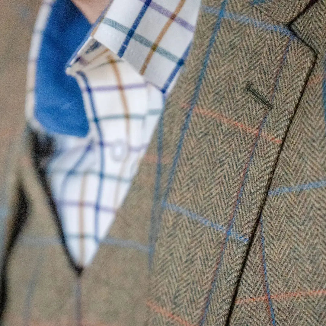 Tweed jacket with herringbone pattern and stripes pairs perfectly with Premium Tattersall Shirt