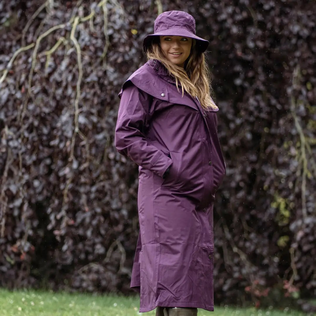 Purple raincoat with matching hat for uncompromising wet weather style outdoors