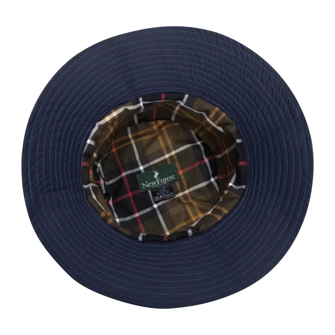 Navy blue bucket hat with plaid lining, perfect for the Forest Victoria Waterproof look