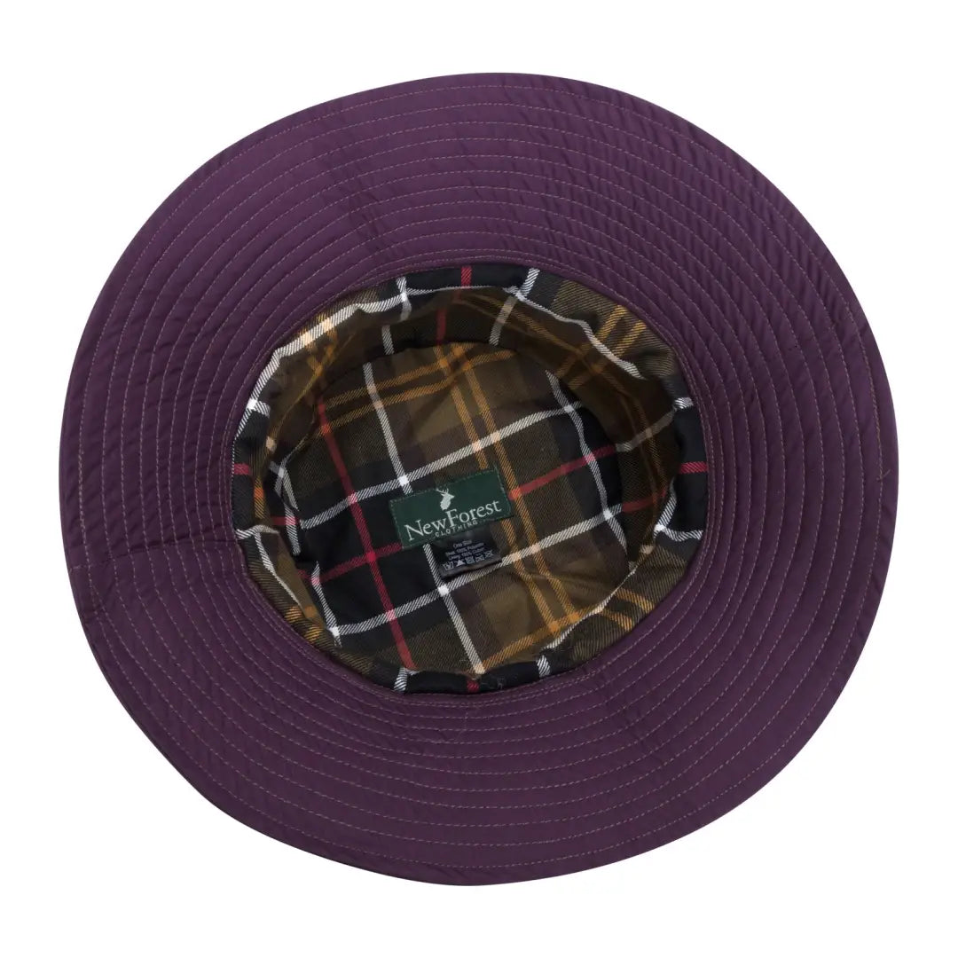 Purple wide-brimmed Victoria Hat with plaid lining and outer waterproof fabric