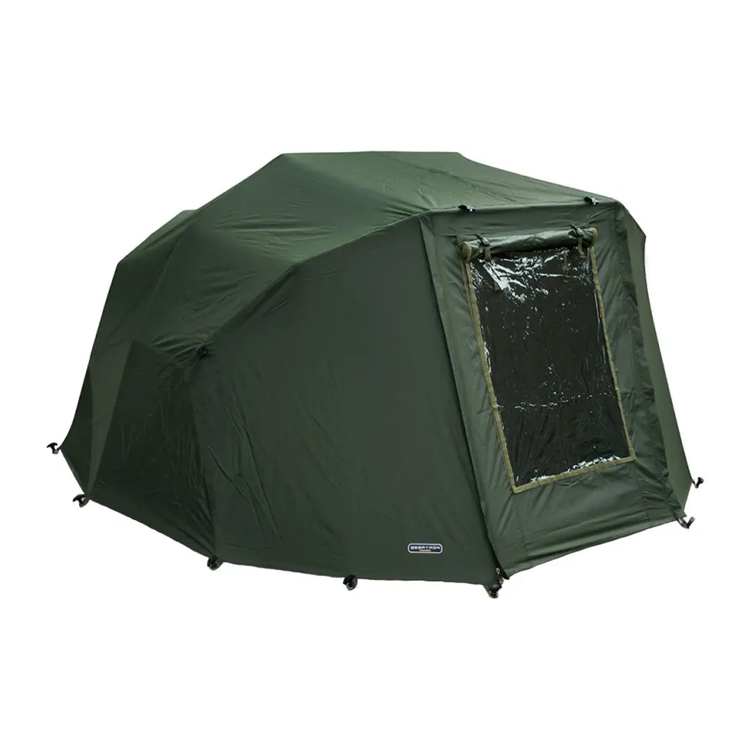 Green camping tent featuring a clear vinyl window for the NGT Wrap Winter Overskin