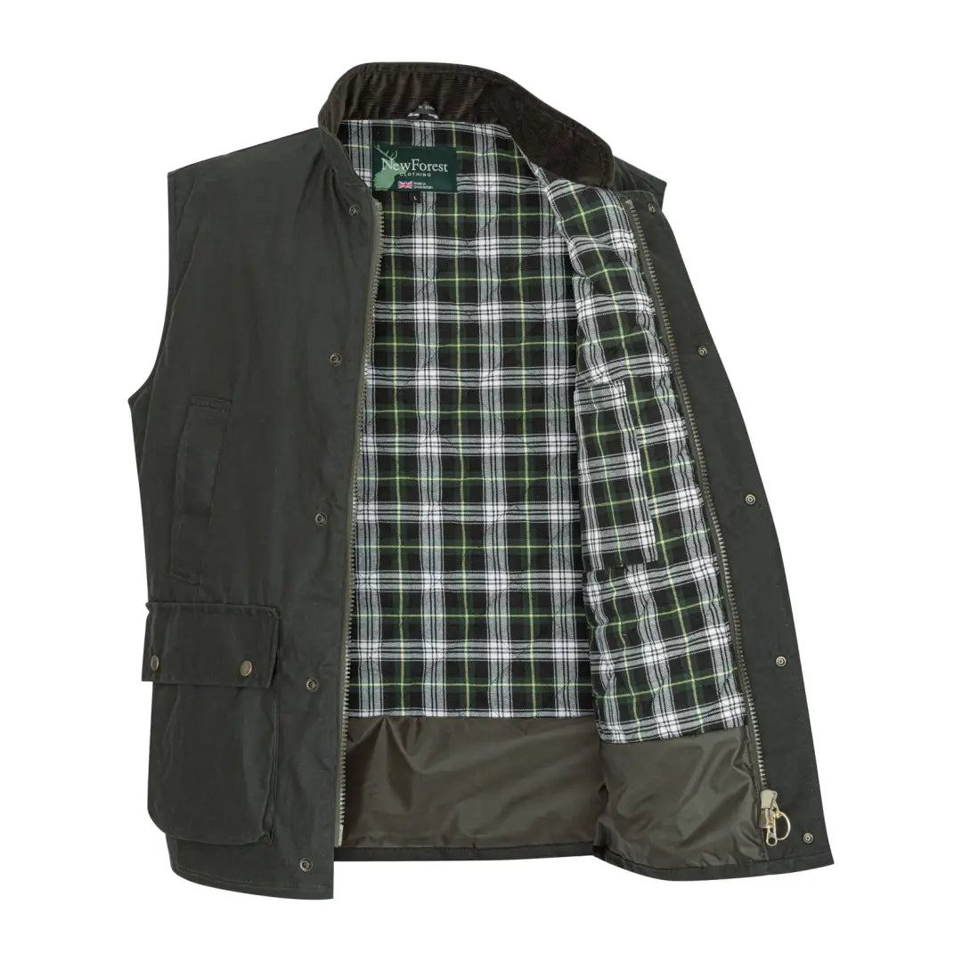 Dark green Padded Wax Gilet with plaid lining and pockets for outdoor adventures