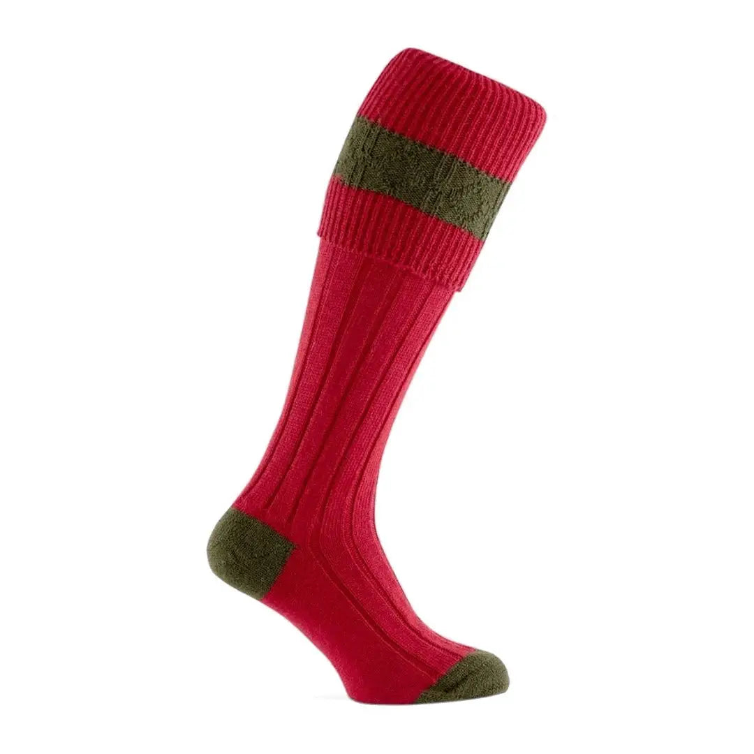 Red knee-high Pennine Byron Shooting Socks with green accents and ribbed texture