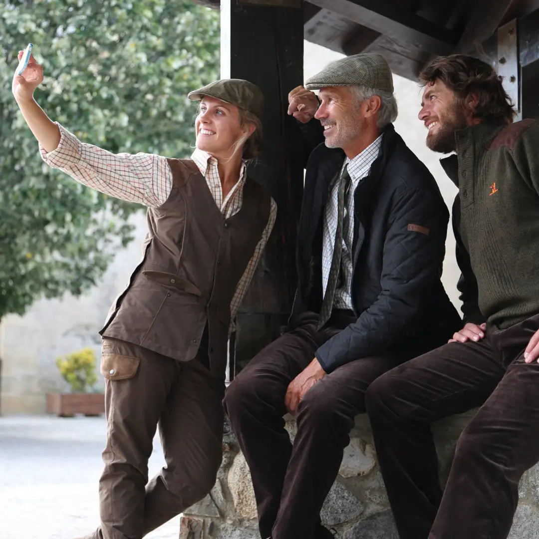 Three guys in period clothing taking a selfie in a Percussion Stallion quilted jacket