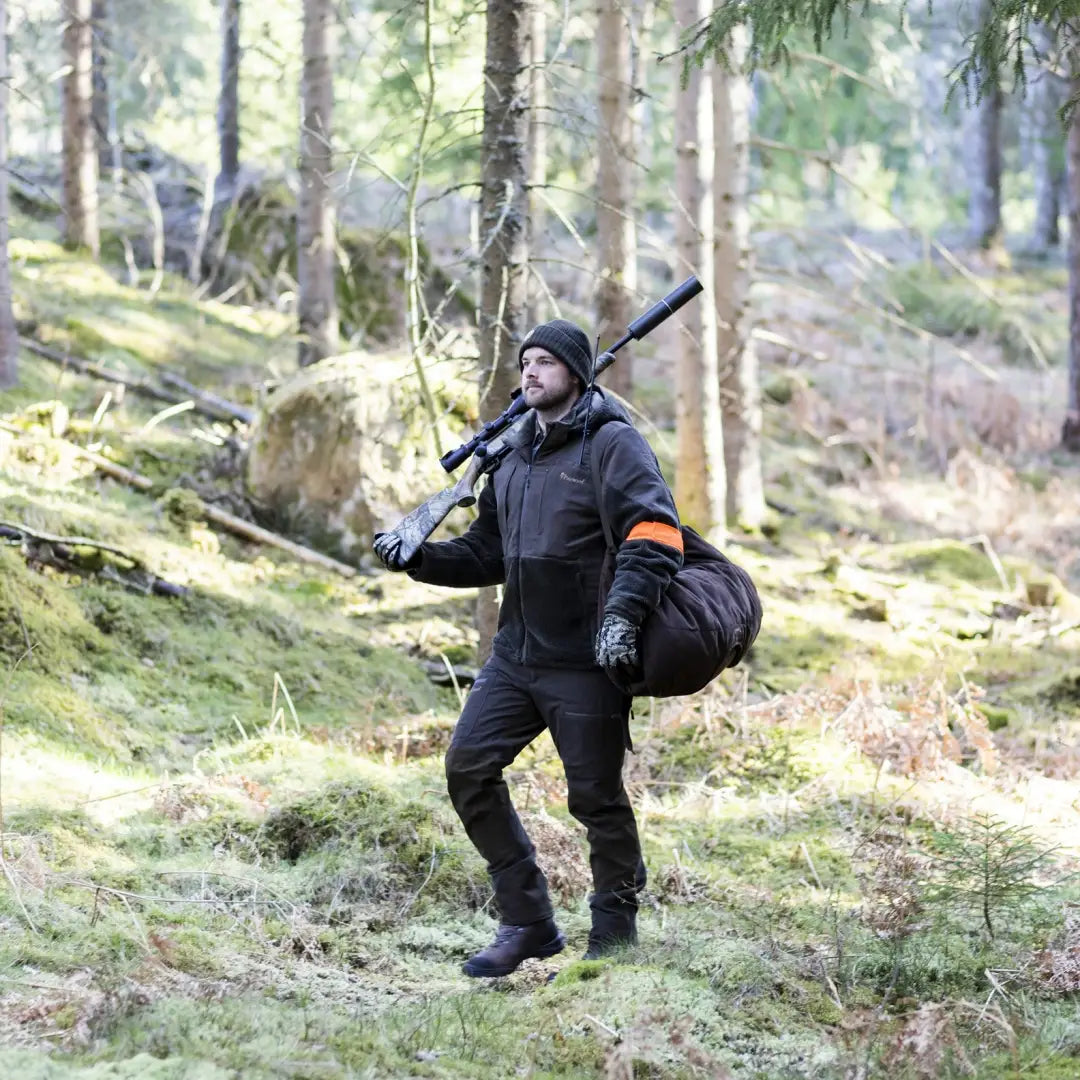 Hunter in Pinewood Caribou Hunt Extreme Trousers, ready for a waterproof caribou hunt