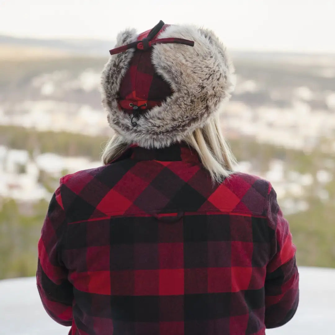 Fur-trimmed winter hat with ear flaps paired with Pinewood Ladies Canada Classic 2.0 Shirt