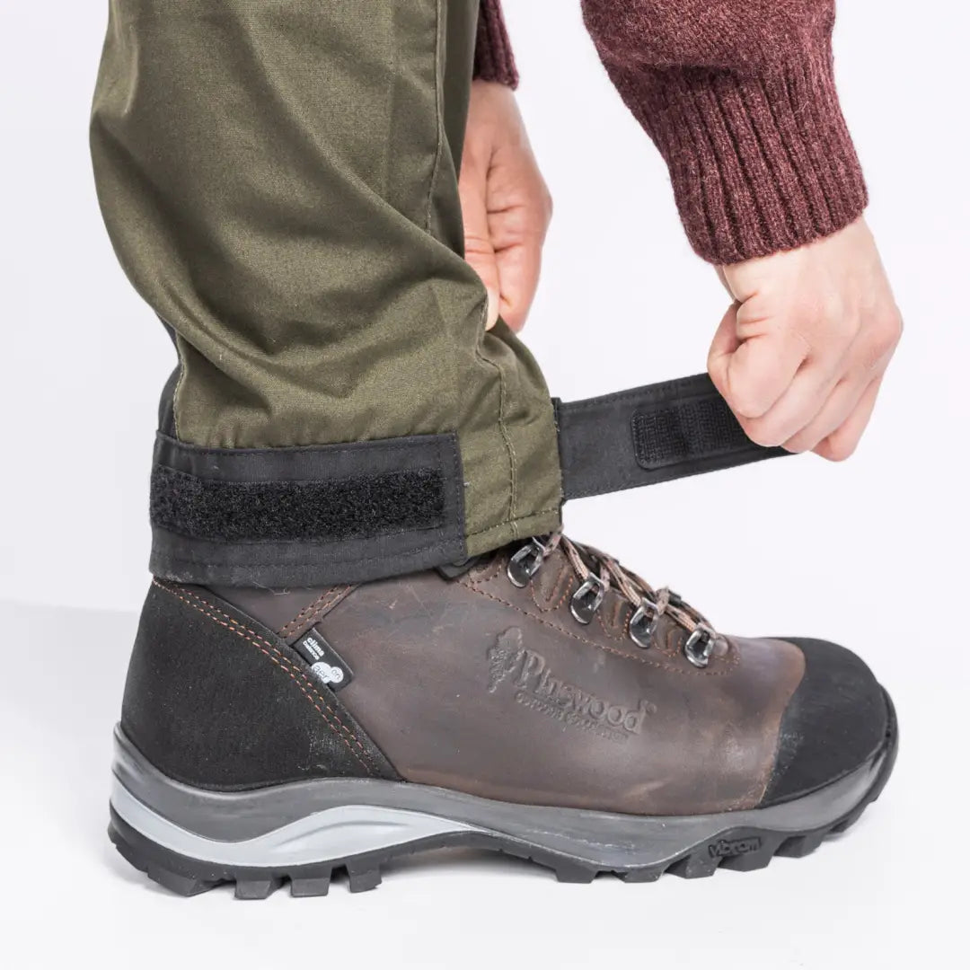 Hiking boot with adjustable ankle strap worn with Pinewood Ladies Caribou TC Trousers