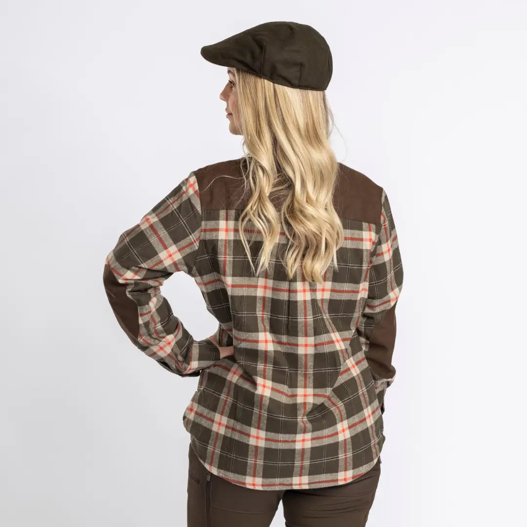 Plaid flannel Pinewood Ladies Douglas Shirt paired with a cap, perfect for country clothing adventures