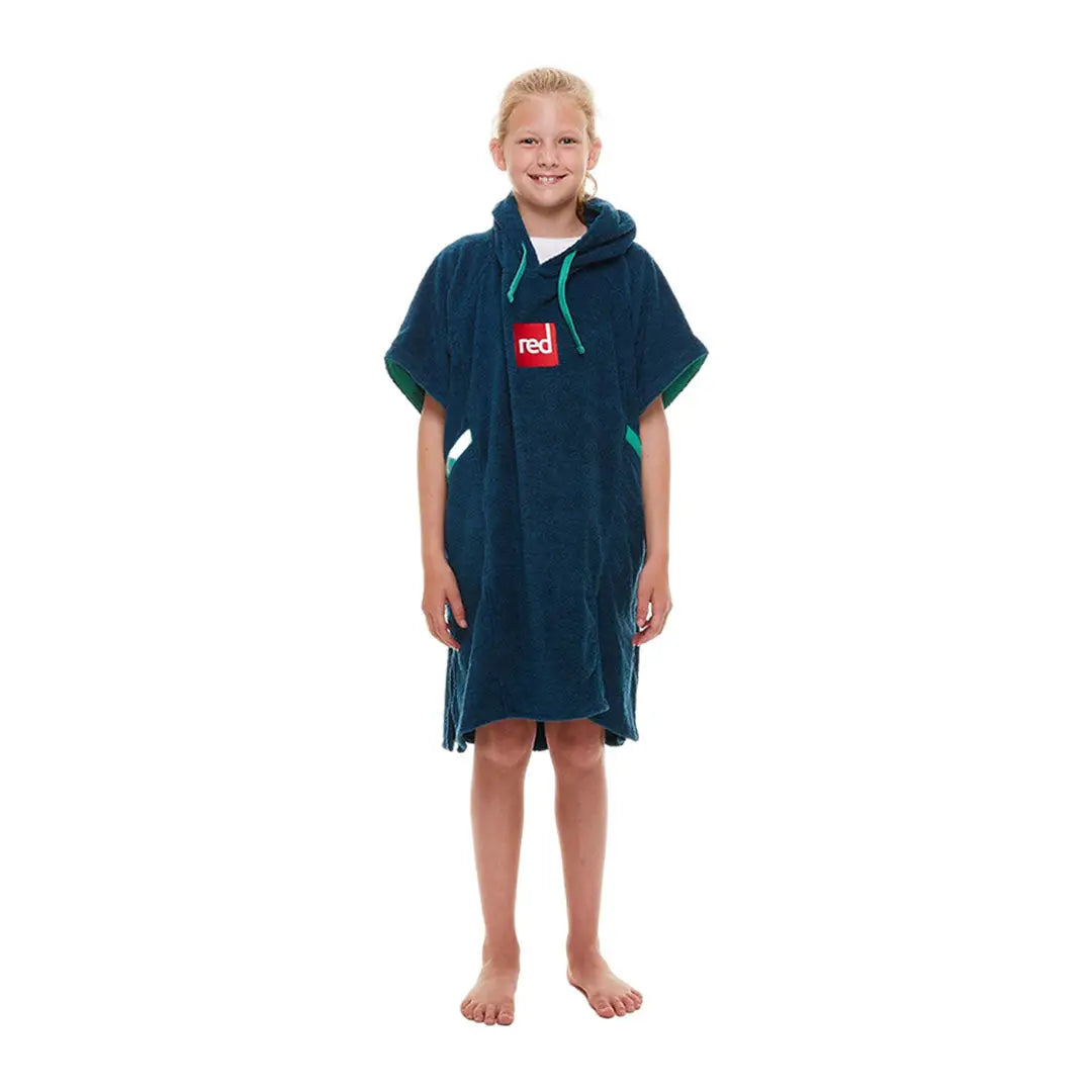 Navy blue kids luxury towelling change robe with red logo worn by young person