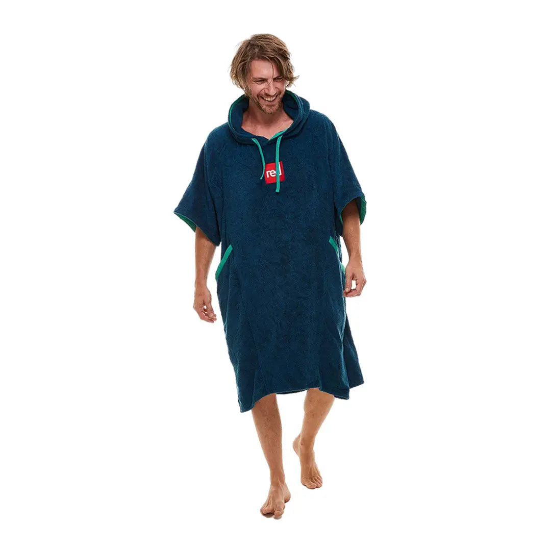 Teal hooded poncho towel worn by a person from Red Luxury Towelling Change Robe