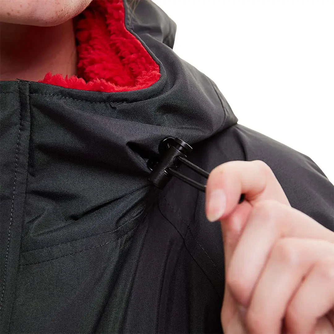 Black winter jacket with red lining and zipper, perfect for Pro Change long sleeves