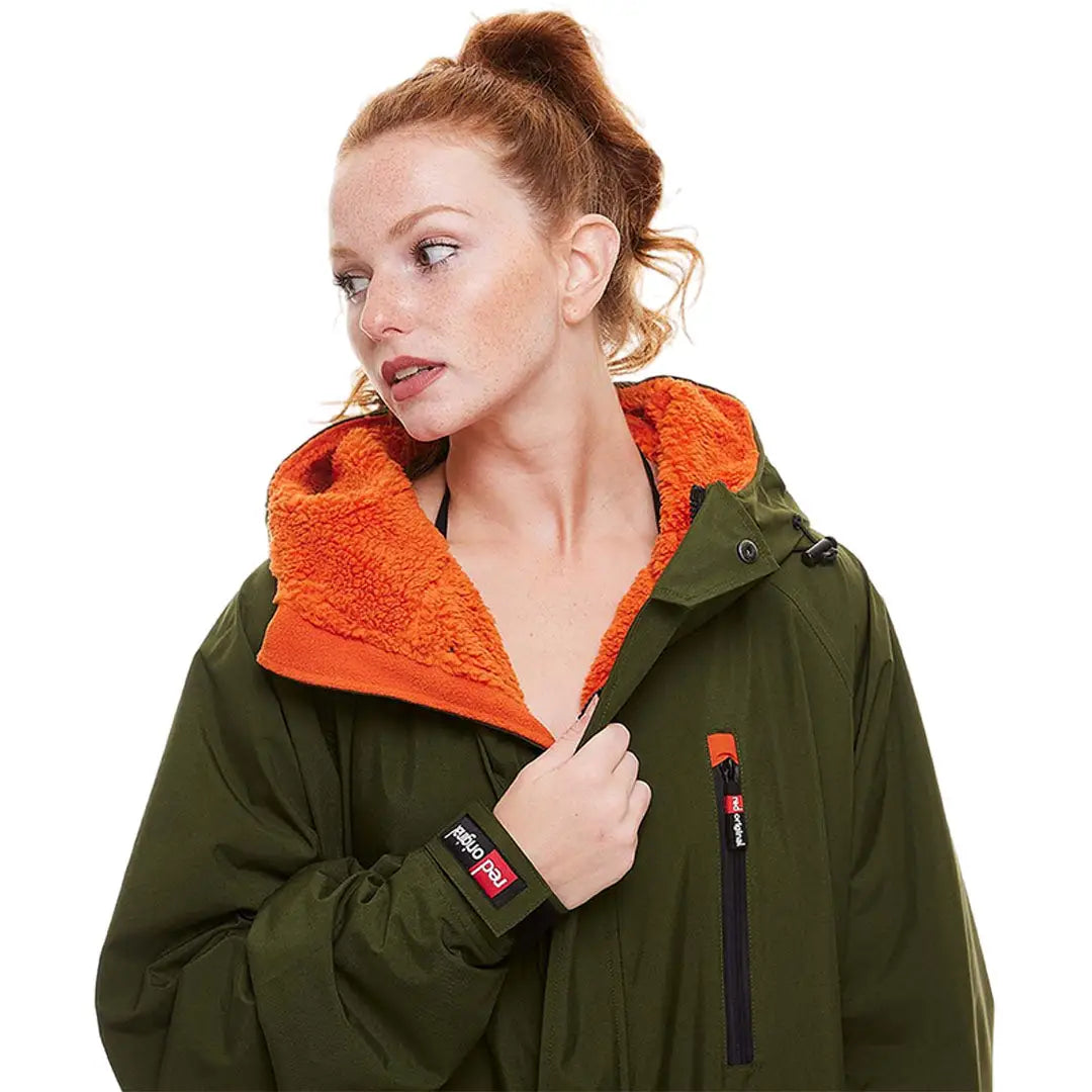 Green winter jacket with orange fleece lining, perfect for your Change Robe collection