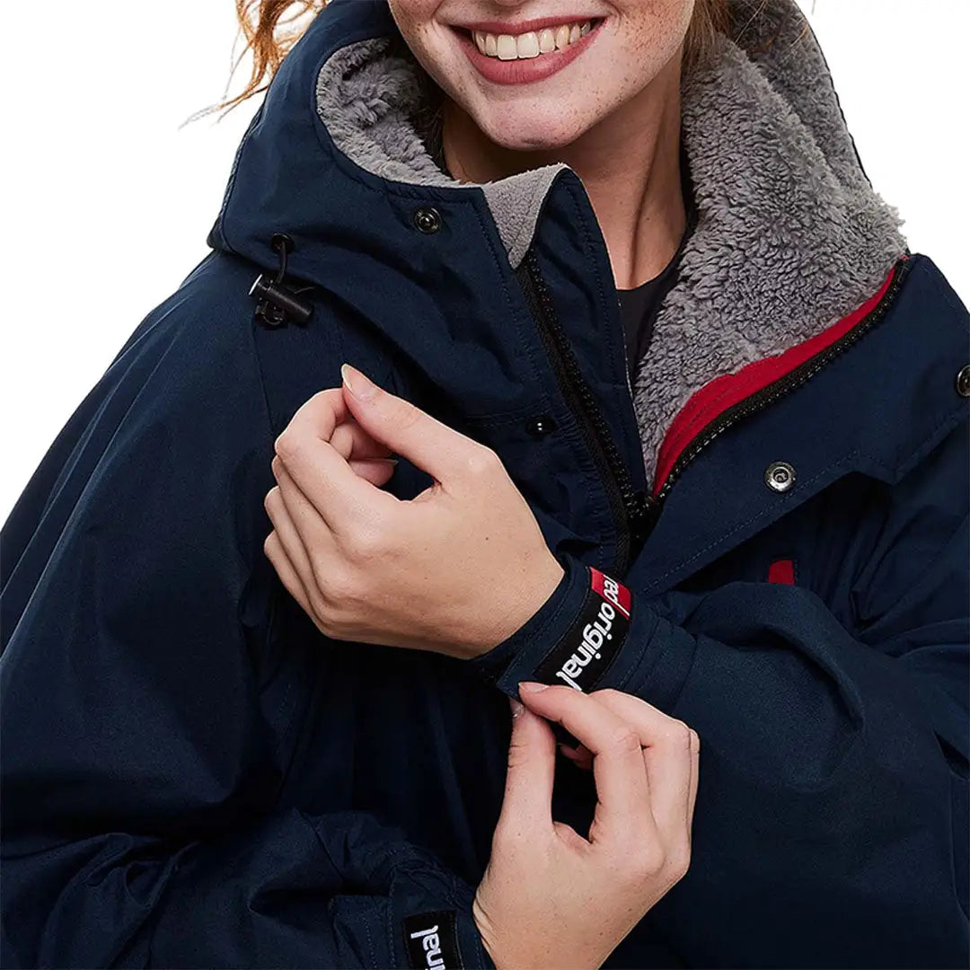 Navy blue winter coat with gray fur collar and red lining for your ultimate changing robe style