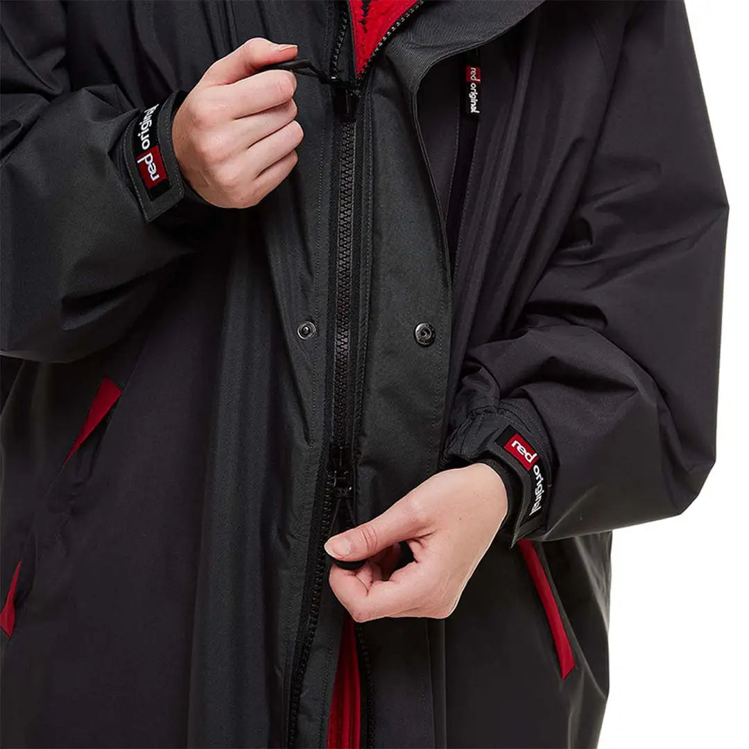 Black winter jacket with red accents and zippers from Red Pro Change Long Sleeve Evo Jacket