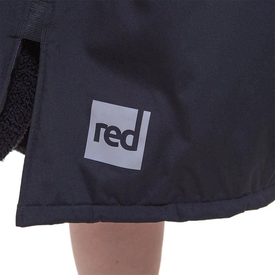 Dark shorts with a red logo, perfect match for the Red Pro Change Long Sleeve Evo Jacket