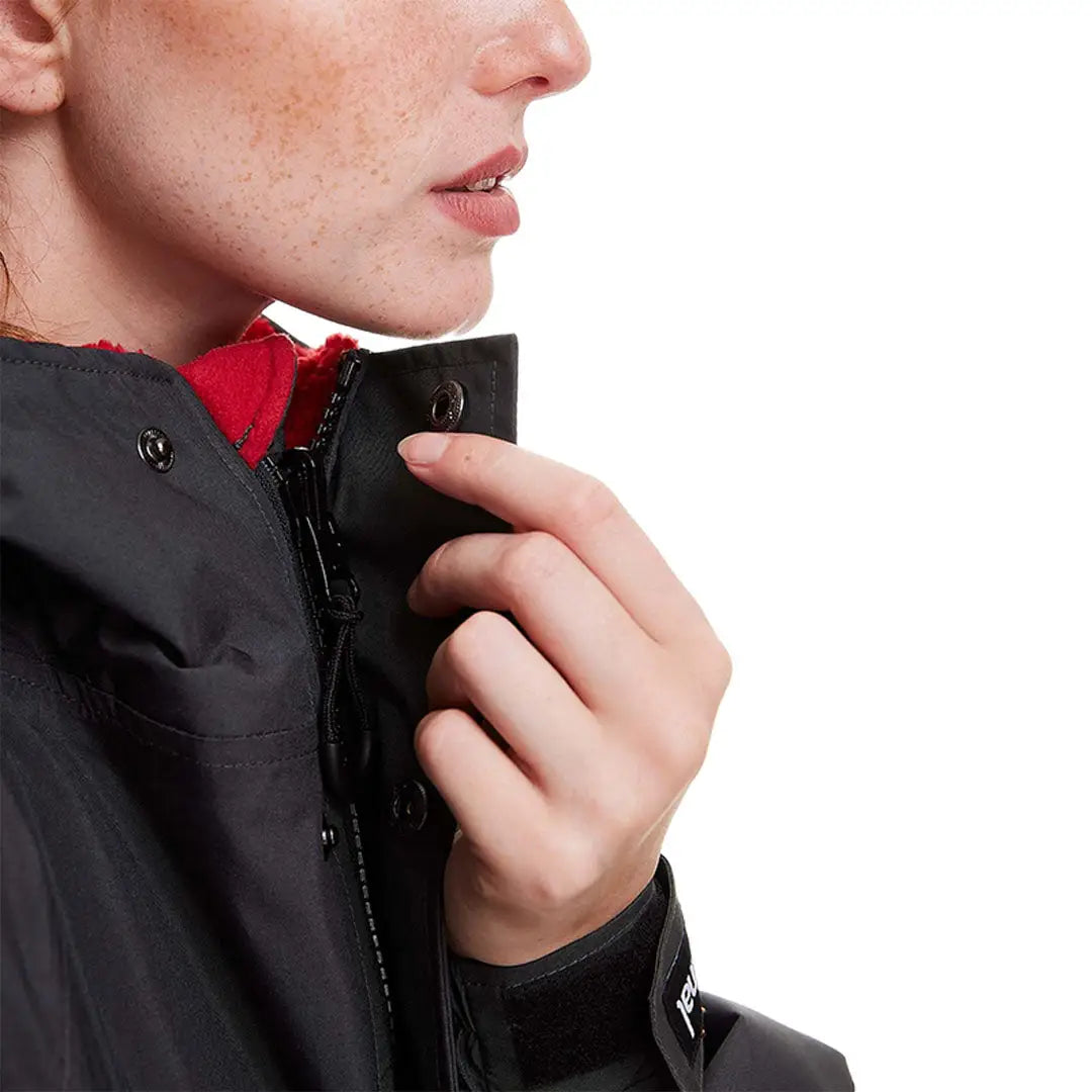 Black jacket with a red collar, showcasing the Red Pro Change Long Sleeve Evo Jacket