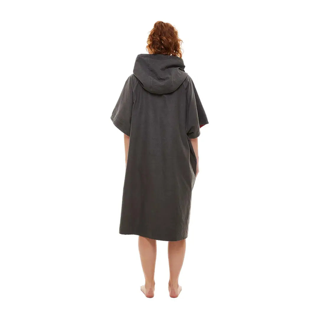 Gray hooded microfibre changing robe worn by a person with curly hair from behind