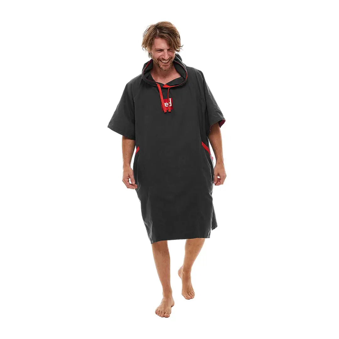 Hooded Red Quick Dry Microfibre Changing Robe poncho with short sleeves worn by a person