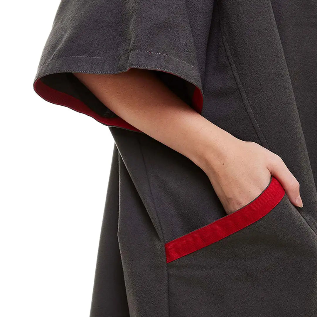 Dark gray microfibre changing robe with red-trimmed pocket and sleeve details