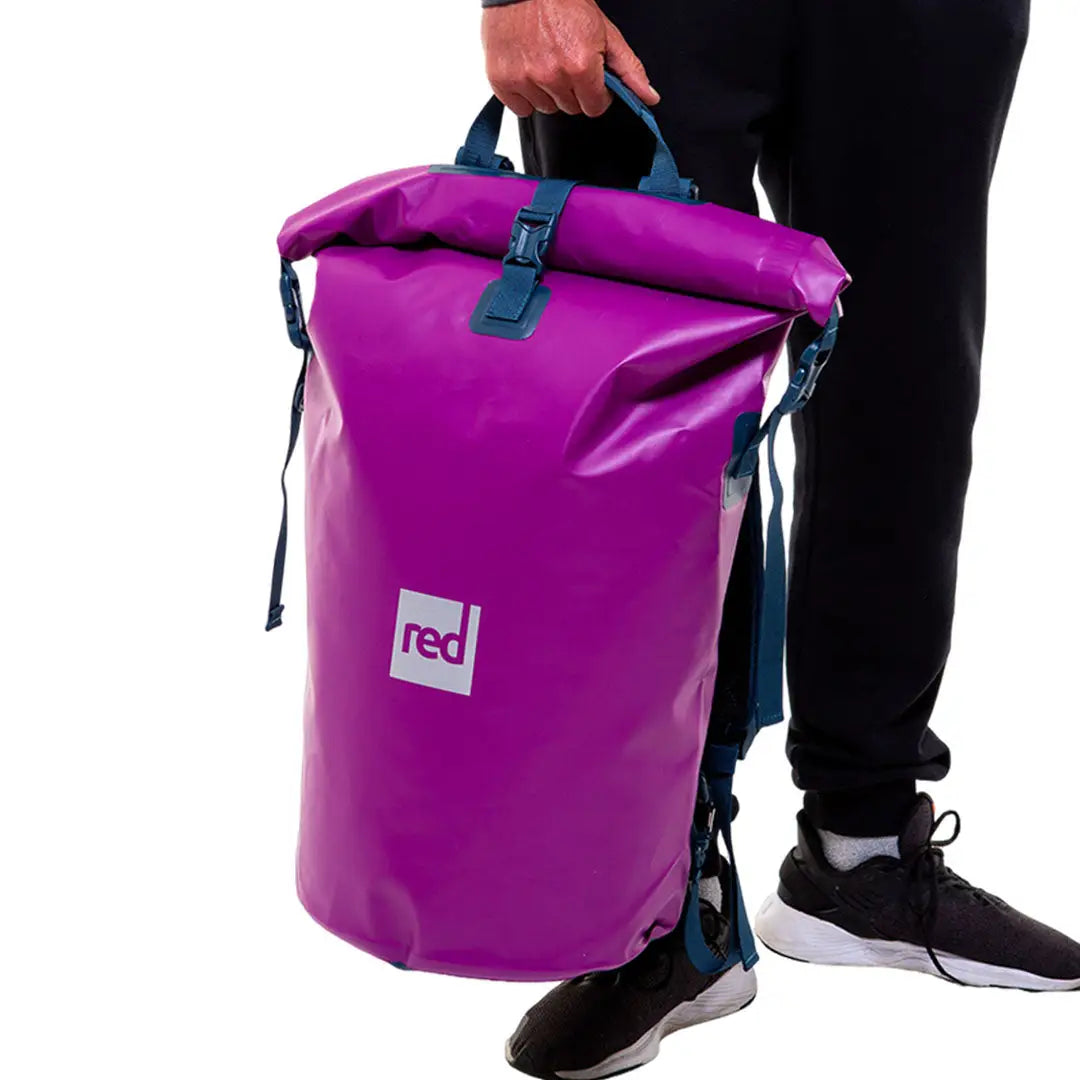 Bright purple waterproof dry bag with red logo great for adventures, made in custom sizes