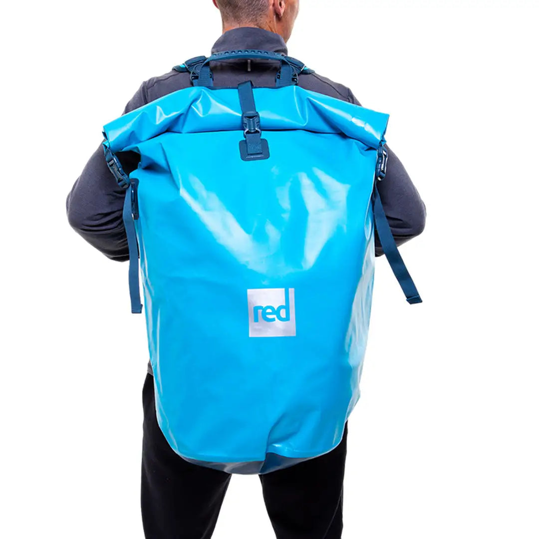 Bright blue waterproof backpack with roll-top closure perfect for country clothing and hunting