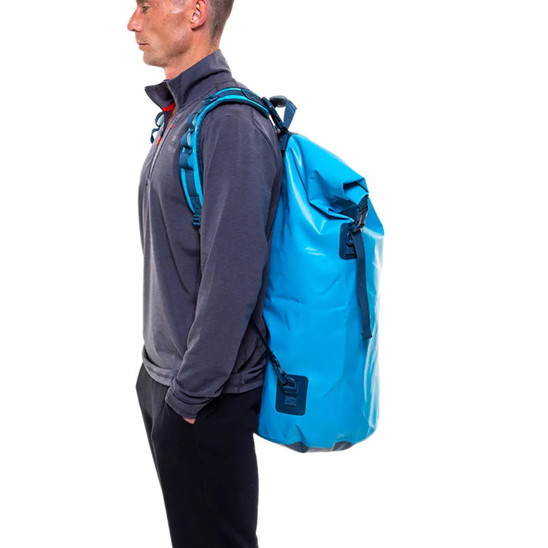 Bright blue waterproof backpack with country clothing, perfect for hunting adventures