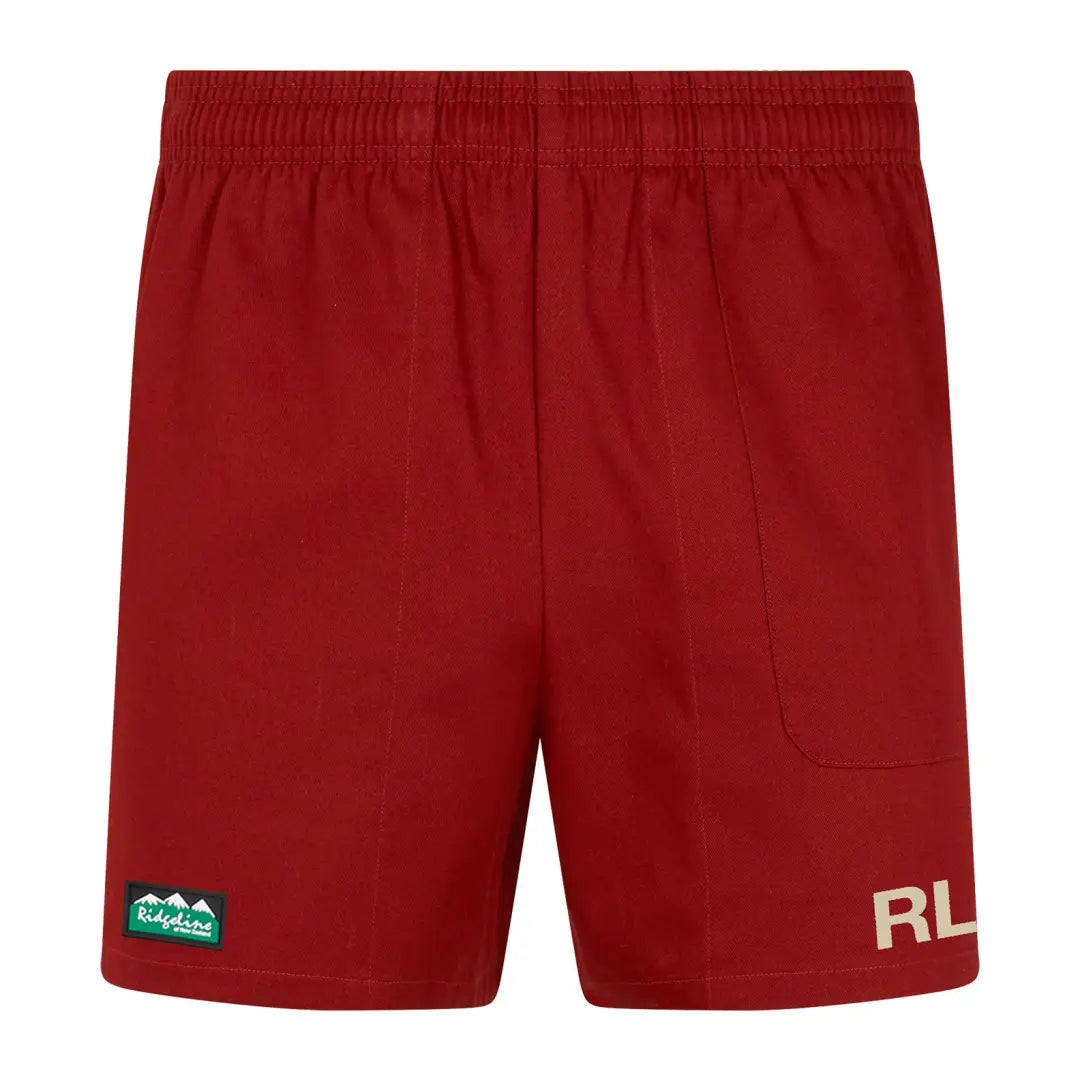 Red athletic shorts with RL lettering and green logo, perfect for outdoor hunting adventures