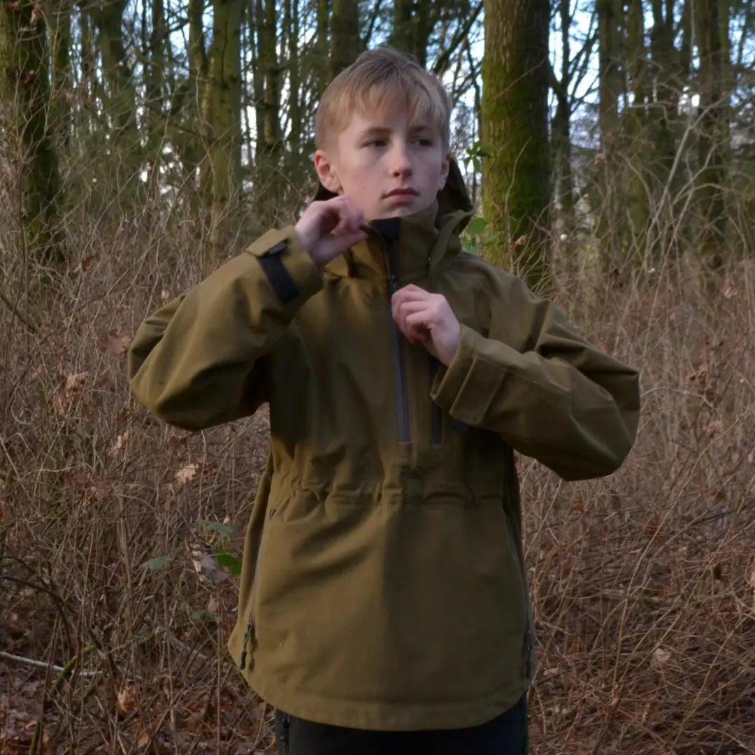 Child in Olive Green Jacket Exploring Woods in Ridgeline Kids Monsoon Classic Smock