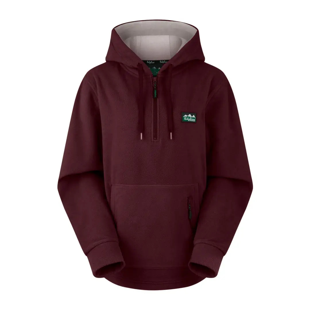 Burgundy ladies ballistic hoodie with green logo on chest, perfect for casual wear