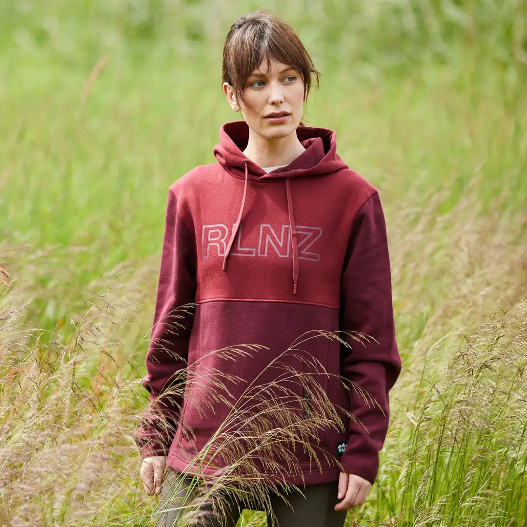 Burgundy ladies South Island hoodie with RLNZ text on the front for a stylish look